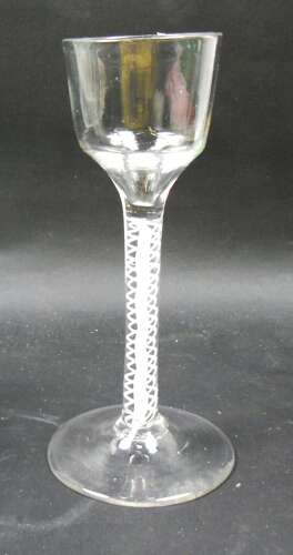 A Double Series Opaque Twist Wine Glass With Ogee Bowl And Conical Foot, English C.1770