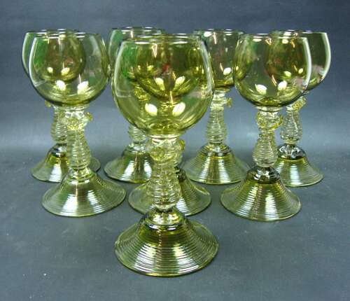 A set of eight pale green glass roemers, Bohemian c.1880