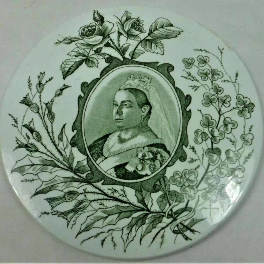 A small ceramic scale pan green transfer printed for Queen Victoria's Jubilee 1887