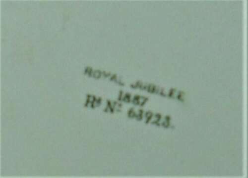 A small ceramic scale pan green transfer printed for Queen Victoria's Jubilee 1887
