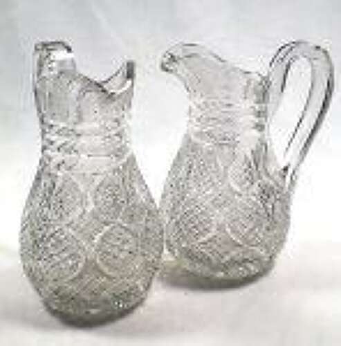 Wonderfully cut crystal glass wine jugs with engraved fruiting vine detail, English circa 1870
