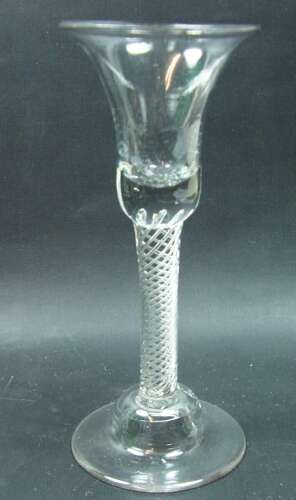 Air twist wine glass with flared bowl and high domed foot English circa 1750
