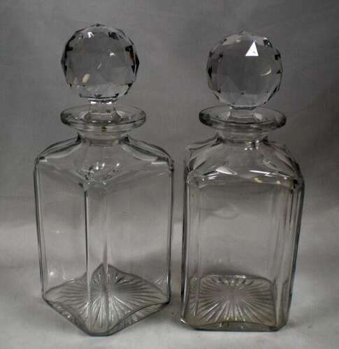 A pair of heavy square section crystal glass spirit decanters English circa 1880