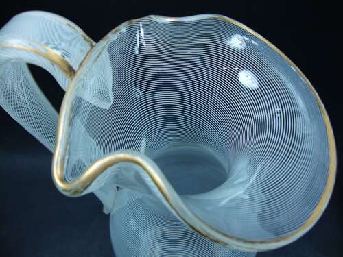 A crystal glass wine jug with white glass latticinio decoration, Baccarat, France c.1860