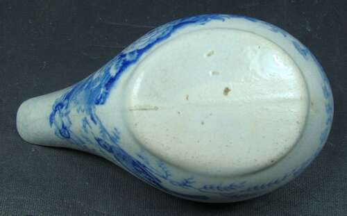A small blue printed ceramoc pap boat, English c.1830