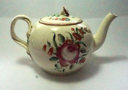 A cream ware bullet shaped tea pot, English c.1780