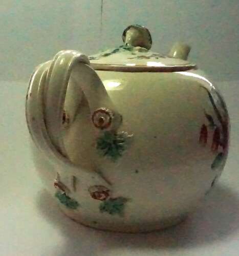 A cream ware bullet shaped tea pot, English c.1780