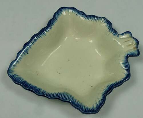 A cream ware pickle leaf with blue painted rim, English c.1780